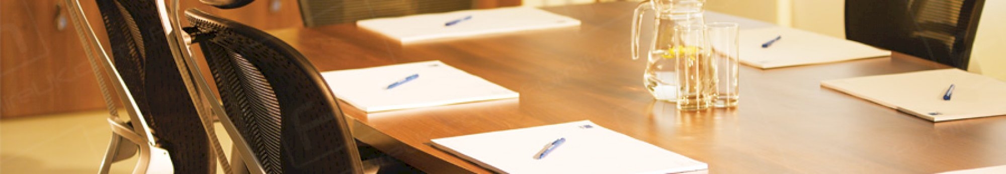 executive boardroom desk close up