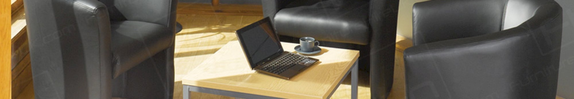 tub chairs and oak coffee table