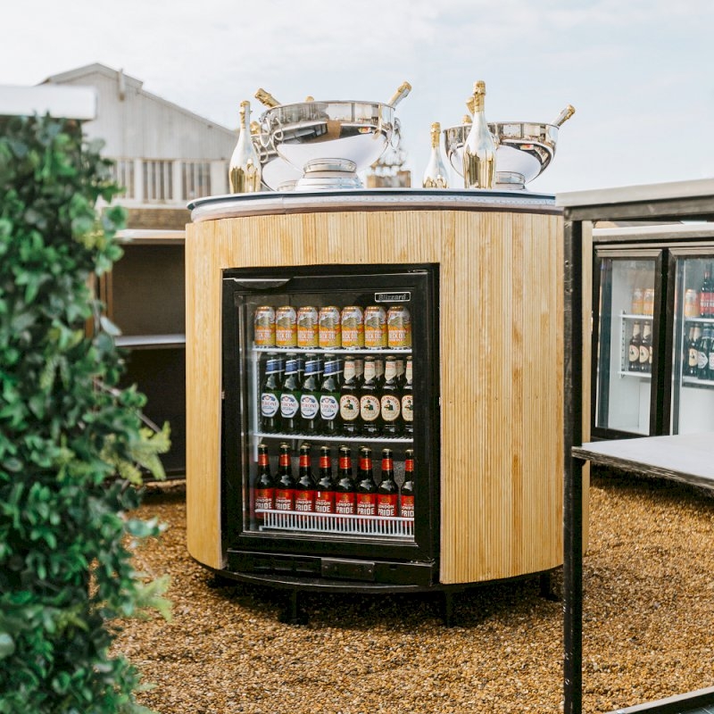 Circular Reeded Back Bar With Two Single Fridges
